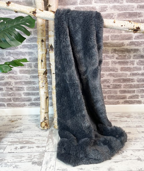 Medium length, plain grey fake fur blanket