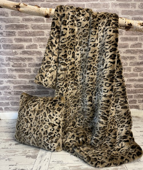 Luxury leopard fur throw and leopard fur cushion