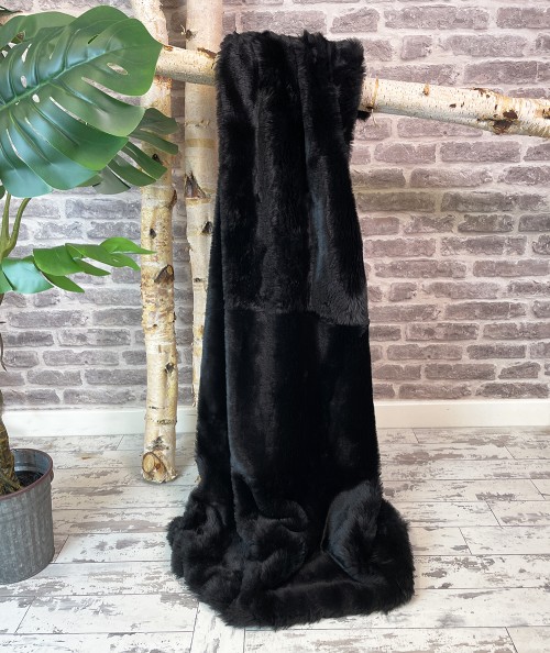 Large black faux fur bedspread