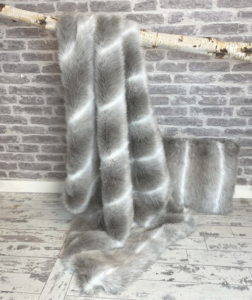 Reindeer faux fur throw with matching cushion