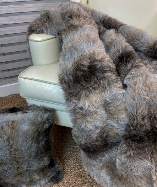 Grey Wolf faux fur throw and Grey Wolf faux fur cushion.