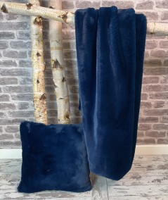 Luxurious blue faux fur throw with matching fur cushion