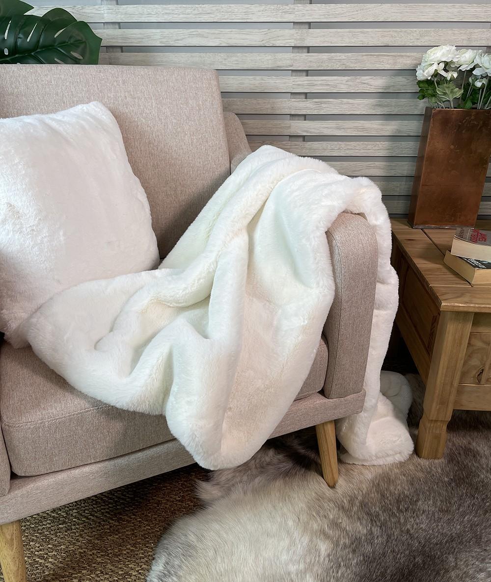 Luxury cream faux fur throw with matching cream fur cushion