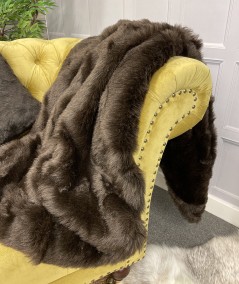 Short haired large brown sofa throw