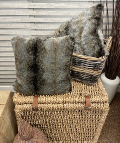 Grey and brown striped fur cushions