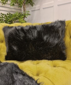 Rectangular black fur cushion with matching fur throw