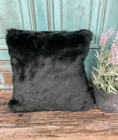 Short haired black fur cushions