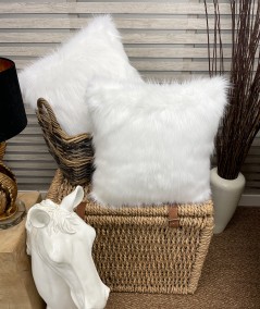 White faux fur cushions