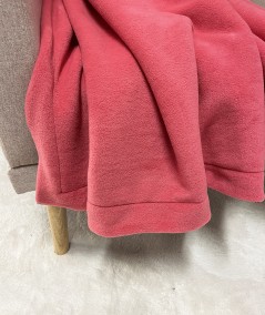 Close up image of the coral fleece throw