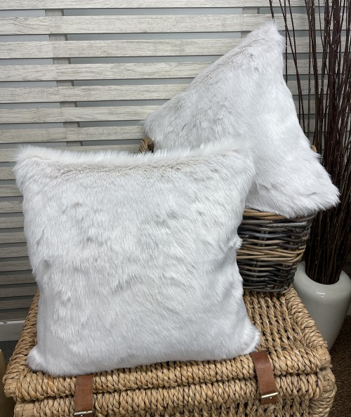 Light coloured luxury faux fur cushions