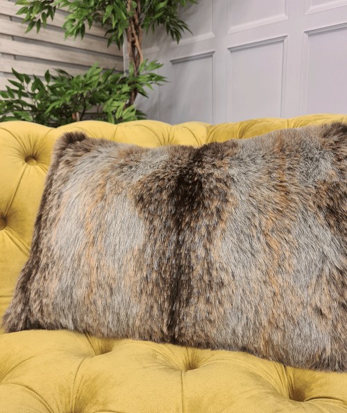 Grey and brown rectangular faux fur cushions