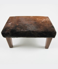 Small rectangular cowhide footstool 310