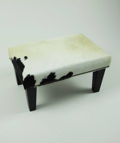 Small cream and black cow hide footrest 325