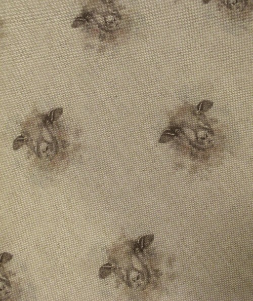 Close up image of the small sheep print fabric