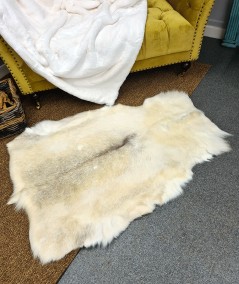 Pale cream reindeer skin rug