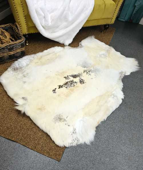 Large pale reindeer hide rug