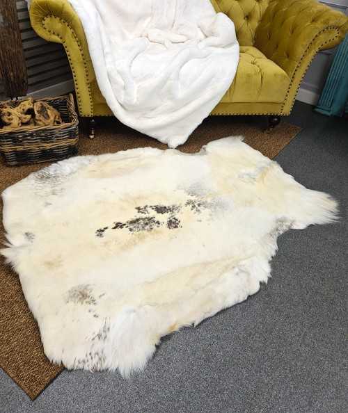 Large pale Caribou skin rug