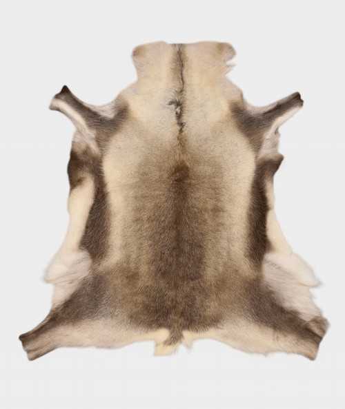 Striking brown and cream reindeer hide rug