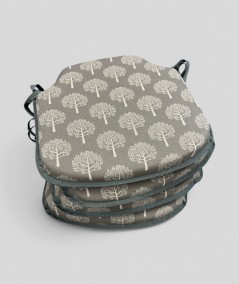 Thick, grey coloured seat cushions with a modern tree design in cream