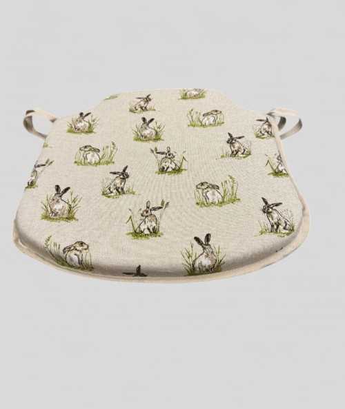 Linen look spindle chair pads with small hare design