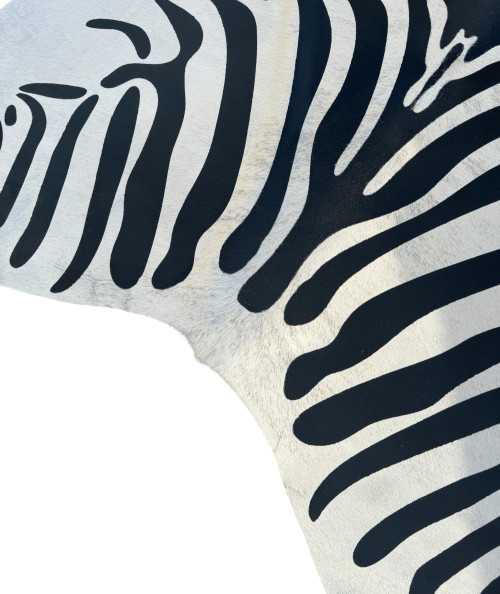 Large black and white zebra print cowhide rug