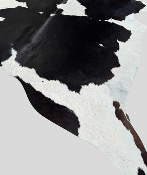 Extra large black and white cowhide rug