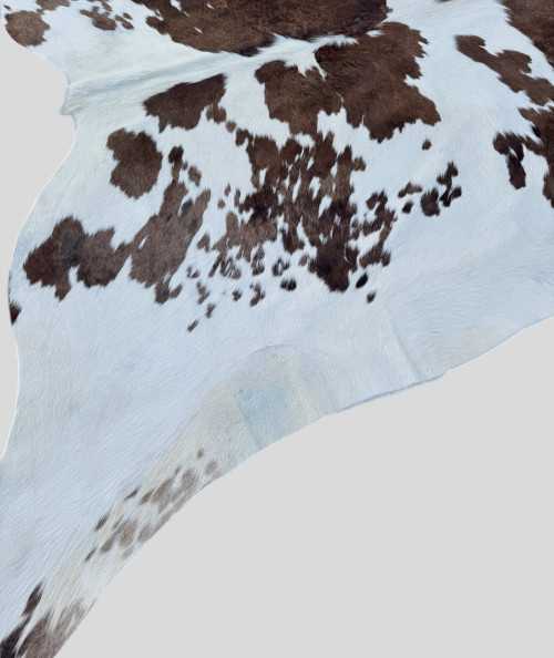 Extra Large Dark Brown and White Cowhide Rug